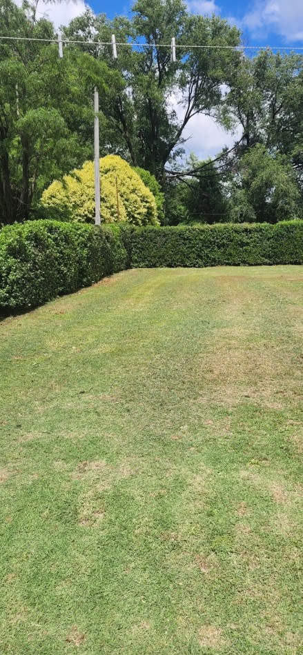 VENTA CASA DOS DORMITORIOS LOTE ESQUINA CON AMPLIO PARQUE
