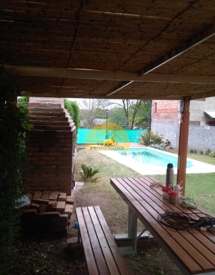 Venta casa 2 dormitorios con garage parque y piscina a metros rio Santa Rosa Calamuchita