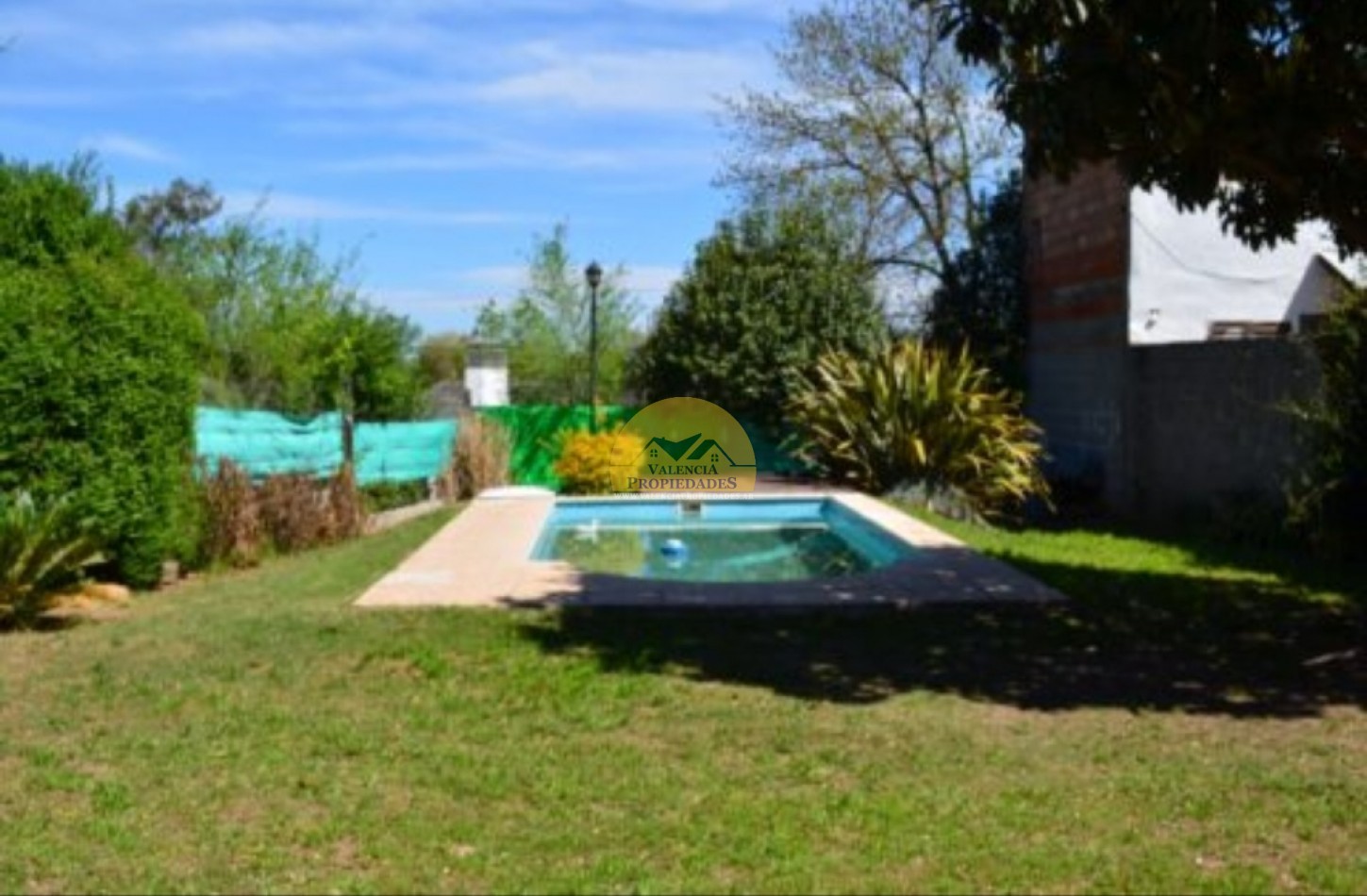 Venta casa 2 dormitorios con garage parque y piscina a metros rio Santa Rosa Calamuchita
