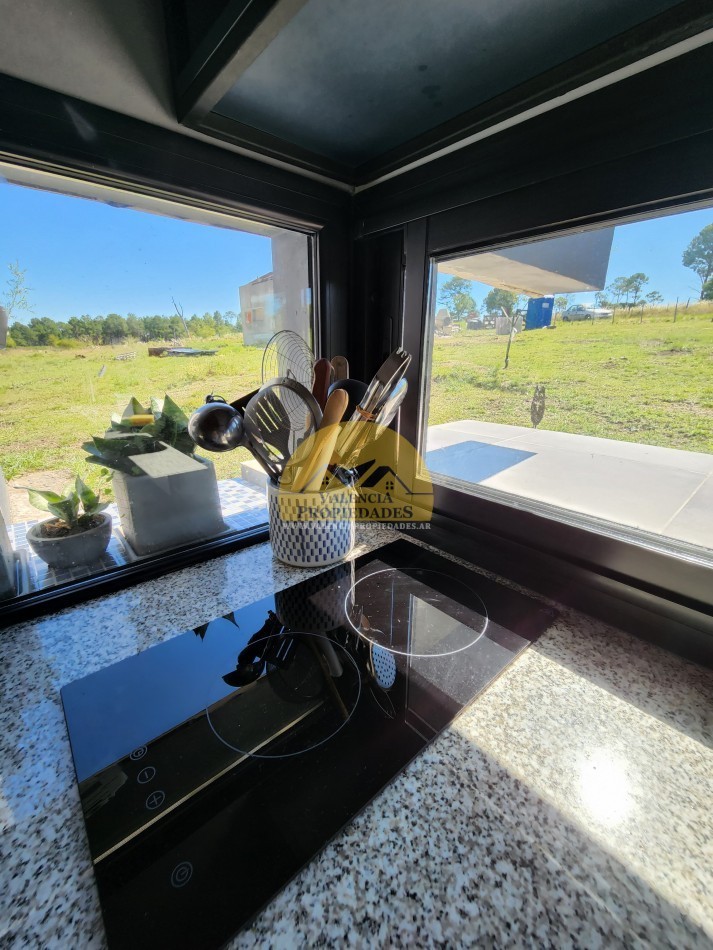 VENTA Espectacular FRACCION DE TERRENO DE 2 hectareas con casa amoblada y equipada mas Mega galpon con recepcion, vivienda y taller VILLA YACANTO DE CALAMUCHITA