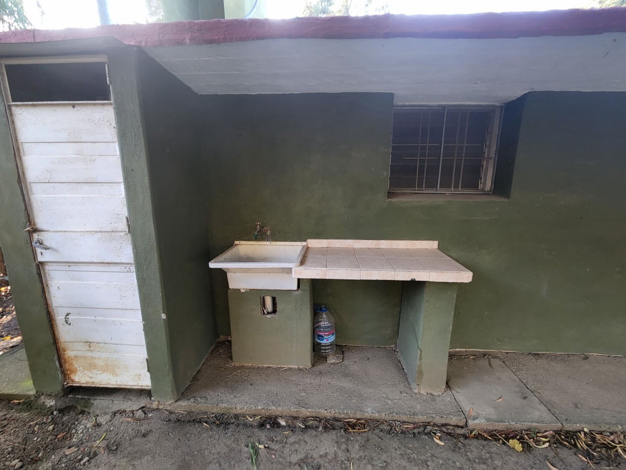 VENTA COMPLEJO DE DEPARTAMENTOS CON AMPLIO PARQUE Y ASADORES A METROS DEL RIO EN SANTA ROSA DE CALAMUCHITA